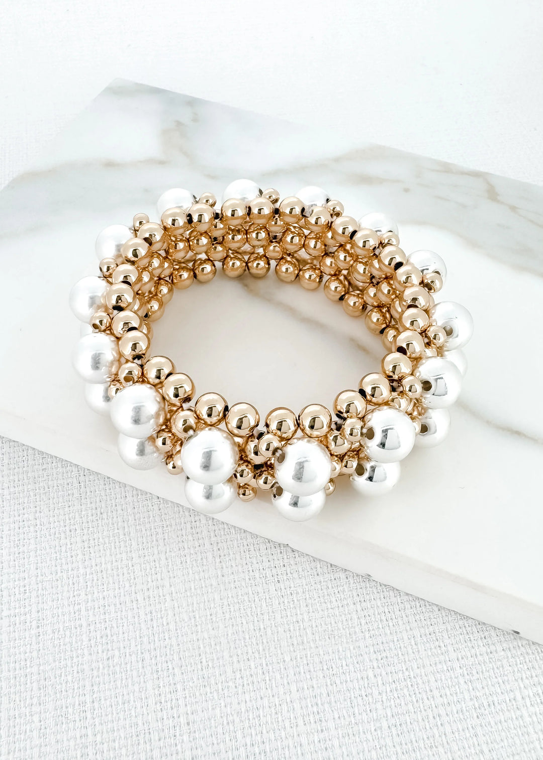 Elasticated Gold Bracelet With Silver Bead Detail