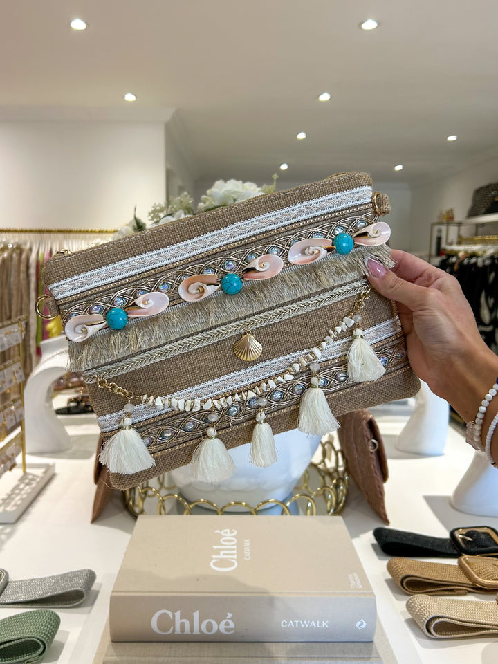 Tan Woven Pink Shell & White Tassel Clutch Bag