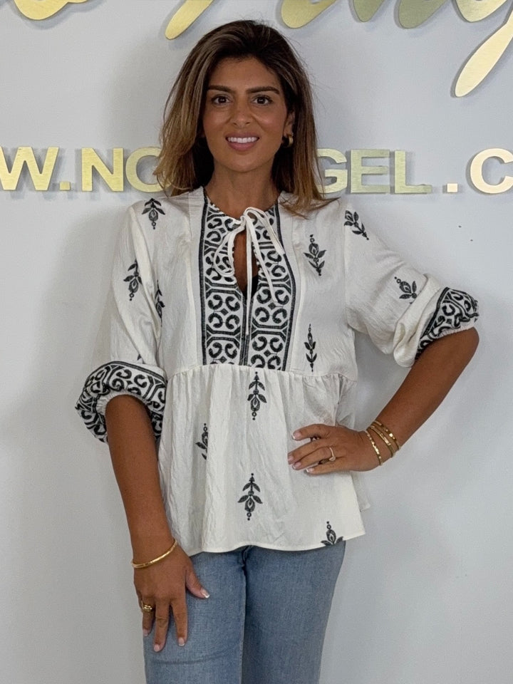 Cream Peplum Tie Up Top With Black Detailing