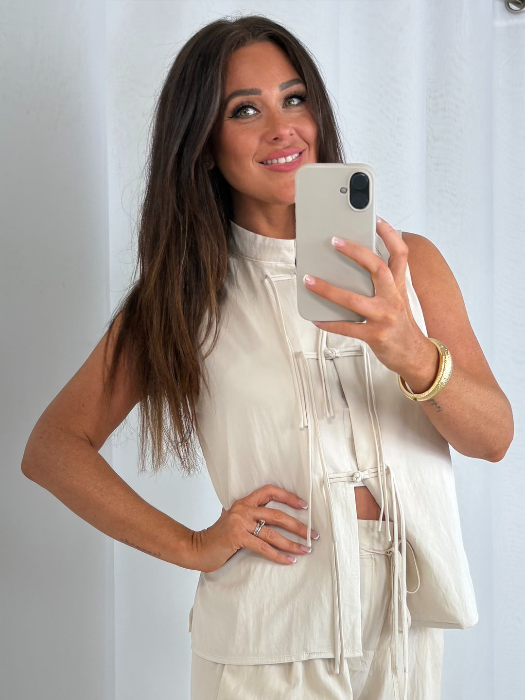 Cream Sleeveless Tie-Front Top With Wide-Leg Trousers